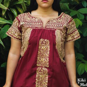Vestido San Antonino vino con bordado doradodeshilado