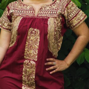 Vestido San Antonino vino con bordado doradodeshilado