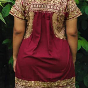 Vestido San Antonino vino con bordado doradodeshilado