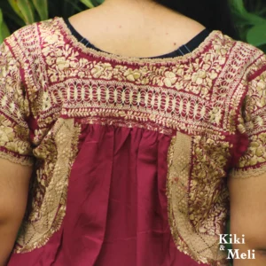 Vestido San Antonino vino con bordado doradodeshilado